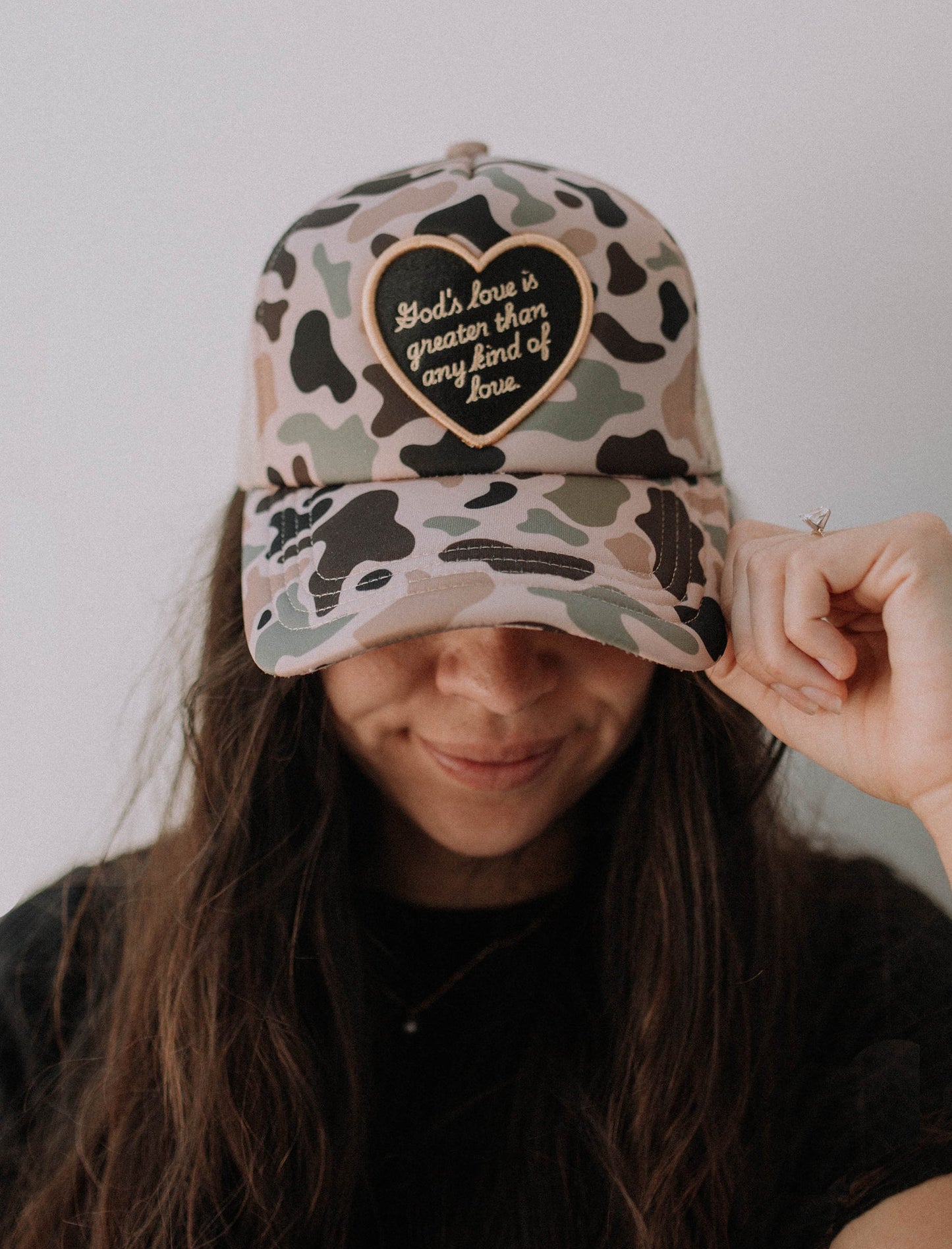 Hat: God's love is greater